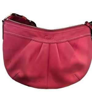 Bright pink coach purse. Loved used but in good condition
